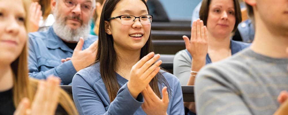 FLCC students practicing American Sign Language together in a class.