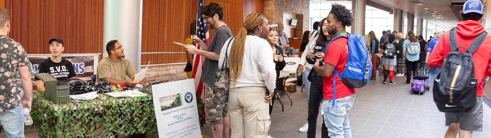 FLCC students hanging out and learning about student life opportunities during Club Table Day.