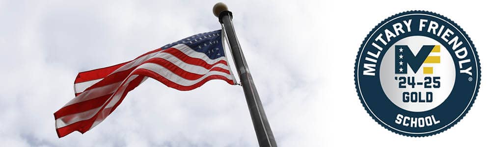 Military friendly school logo and an American flag blowing in the wind.