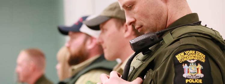 A panel of New York State Environmental Conservation Officers.